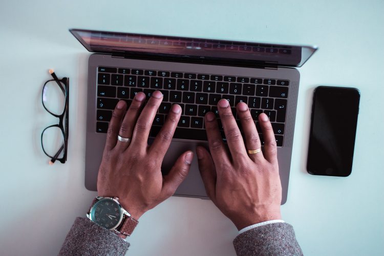 hands working from home